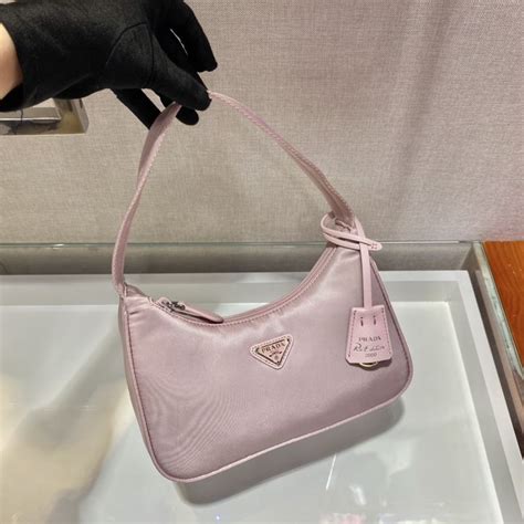 baby pink prada bag.